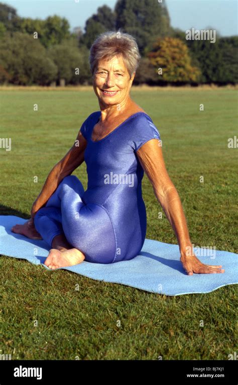 mature yoga|Natural Older Woman Over 60 Embracing Yoga! .